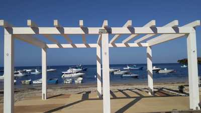 Lido balneare in legno lamellare Abete, realizzato a Petrosino (TP).